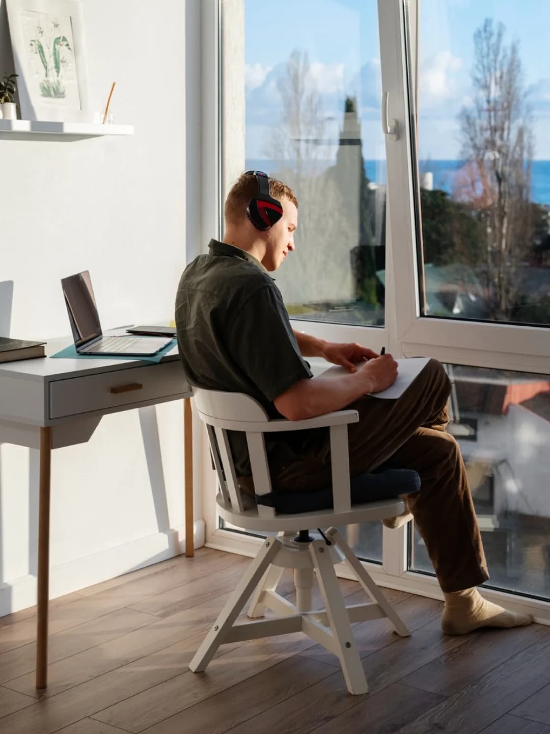 A quiet creative workspace by the window